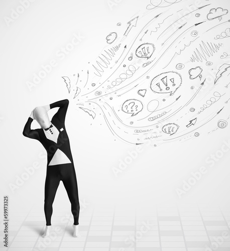 Photo: Guy in body suit morphsuit looking at sketches and doodles Guy in body suit morphsuit looking at sketches and doodles