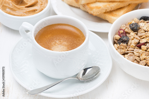 Photo: freshly brewed espresso and muesli for breakfast freshly brewed espresso and muesli for breakfast
