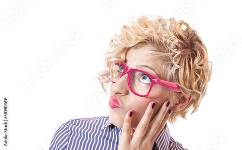 Photo: Close up of a funny woman making face Close up of a funny woman making face