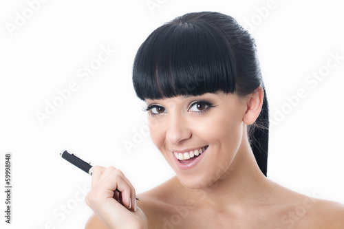 Photo: Young Woman Holding a Pen Young Woman Holding a Pen