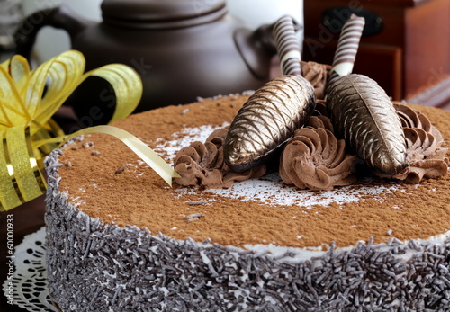 Photo: gourmet chocolate cake with festive decorations gourmet chocolate cake with festive decorations