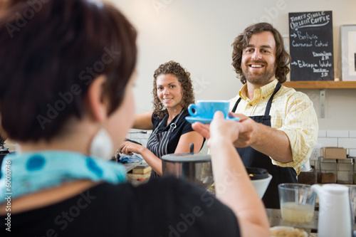 Photo: Barista Serving Customer Barista Serving Customer