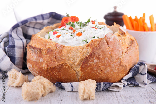 Photo: bread bowl with cheese and vegetables bread bowl with cheese and vegetables