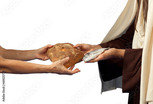 Photo: Jesus gives bread and fish Jesus gives bread and fish
