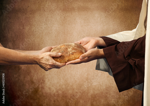 Photo: Jesus gives the bread to a beggar. Jesus gives the bread to a beggar.