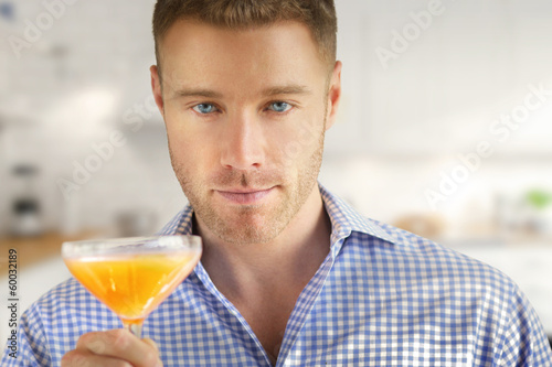 Photo: Man with drink Man with drink