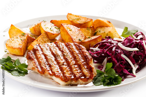 Photo: Grilled steak, baked potatoes and vegetables Grilled steak, baked potatoes and vegetables