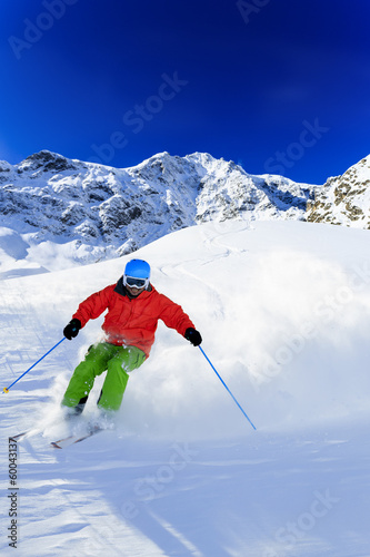 Photo: Skiing, Skier, Freeride in fresh powder snow Skiing, Skier, Freeride in fresh powder snow