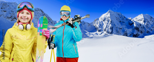 Photo: Ski, skiers - family enjoying winter vacations Ski, skiers - family enjoying winter vacations