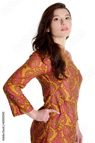 Photo: Young beautiful woman in colorful dress. Young beautiful woman in colorful dress.