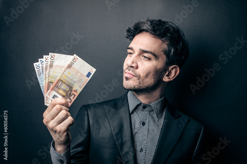 Photo: Man with Money Man with Money
