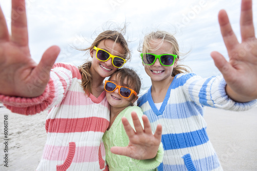 Photo: Girl Children Sisters Playing on Beach Girl Children Sisters Playing on Beach
