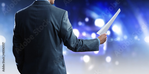 Photo: Business man on stage Business man on stage