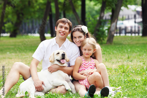Photo: Happy family having fun outdoors Happy family having fun outdoors