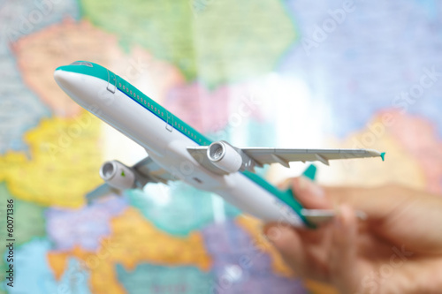 Photo: Young Woman Holding Airplane Young Woman Holding Airplane