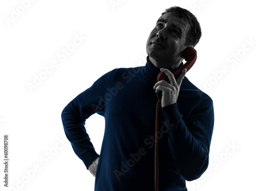 Photo: man waiting on the phone silhouette portrait man waiting on the phone silhouette portrait