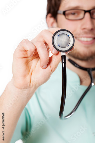 Photo: Closeup of a stethoscope in doctor's hand Closeup of a stethoscope in doctor's hand