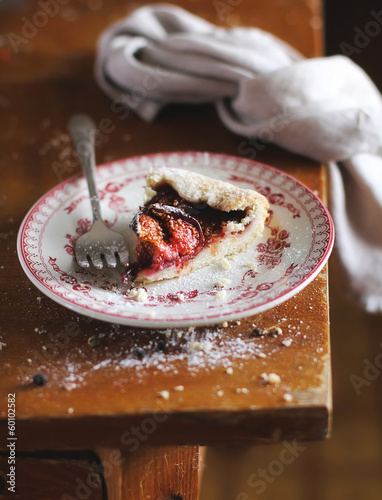 Photo: Homemade rustic pie with ripe figs, raspberry Homemade rustic pie with ripe figs, raspberry