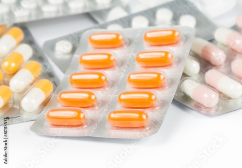 Photo: medicine pills and capsules packed in blisters medicine pills and capsules packed in blisters