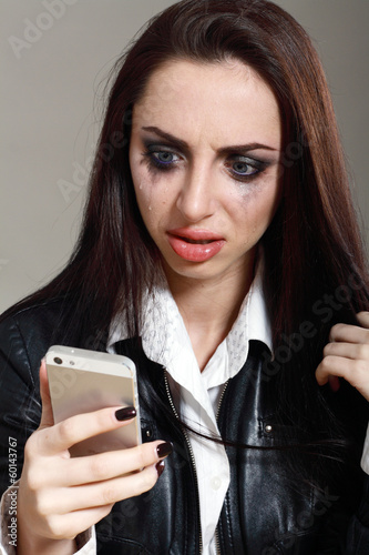 Photo: drunk girl calling on cell phone drunk girl calling on cell phone