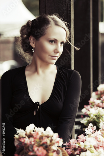 Photo: Beautiful young woman on the porch Beautiful young woman on the porch