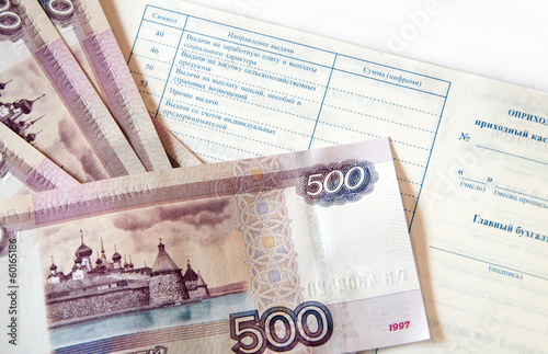 Photo: money and checkbook money and checkbook