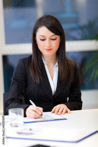 Photo: Businesswoman in her office Businesswoman in her office