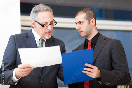 Photo: Couple of businessman discussing Couple of businessman discussing