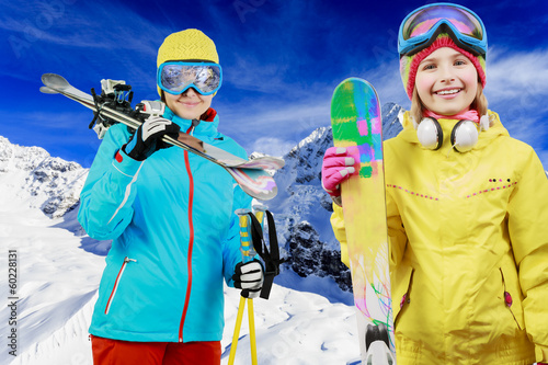 Photo: Ski, snow and fun - family enjoying winter vacations Ski, snow and fun - family enjoying winter vacations