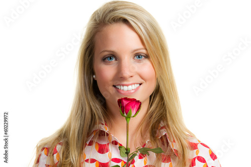Photo: smiling young woman with rose smiling young woman with rose