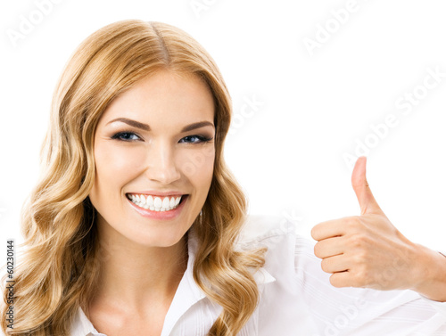 Photo: Businesswoman showing blank signboard, isolated Businesswoman showing blank signboard, isolated