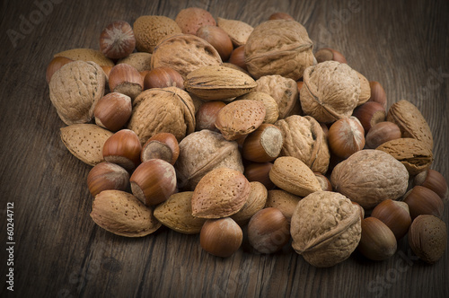 Photo: Nuts mix close up on the wood table Nuts mix close up on the wood table