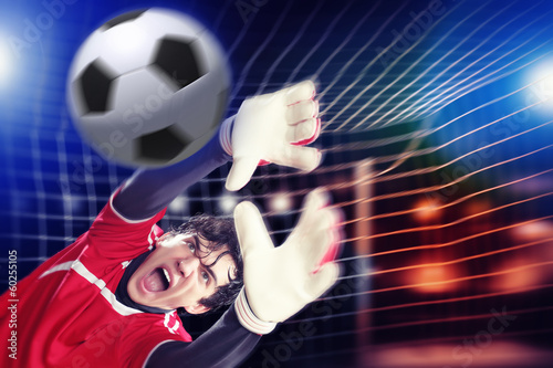 Photo: Goalkeeper catches the ball Goalkeeper catches the ball