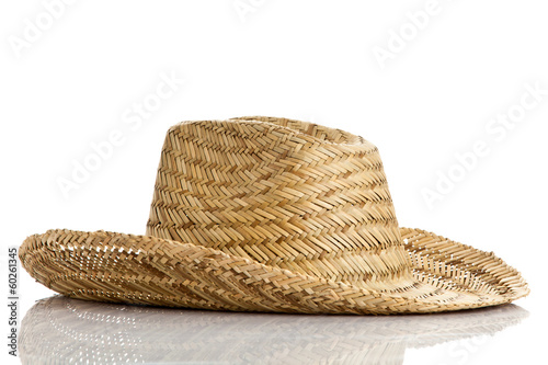 Photo: straw hat isolated on a white background straw hat isolated on a white background