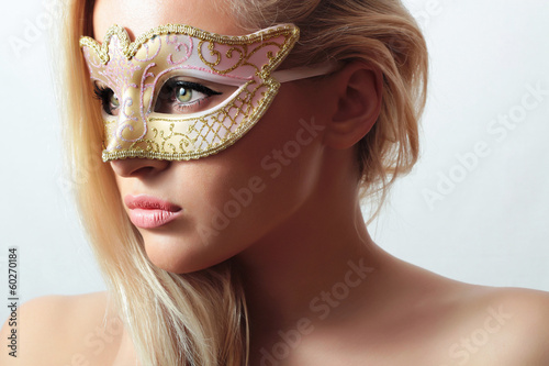 Photo: Beautiful Blond Woman in Carnival Mask.Stranger Sexy Girl Beautiful Blond Woman in Carnival Mask.Stranger Sexy Girl