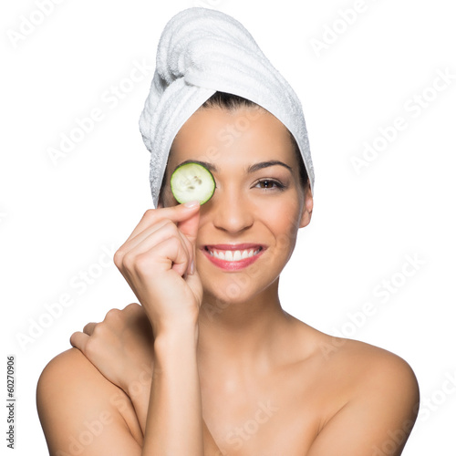 Photo: Beauty Portrait Of Beautiful Woman Holding Slice Of Cucumber Ove Beauty Portrait Of Beautiful Woman Holding Slice Of Cucumber Ove