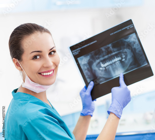 Photo: Female dentist with x-ray picture Female dentist with x-ray picture