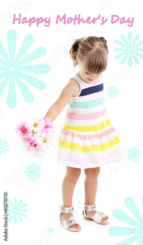 Photo: Little cute girl holding flowers Little cute girl holding flowers