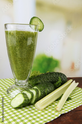 Photo: Glass of green vegetable juice and vegetables Glass of green vegetable juice and vegetables