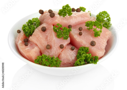 Photo: Raw turkey meat isolated on white Raw turkey meat isolated on white