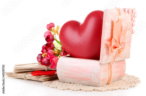 Photo: Still life with heart in wooden casket, isolated Still life with heart in wooden casket, isolated