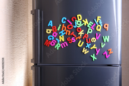 Photo: Colorful magnetic letters on refrigerator Colorful magnetic letters on refrigerator