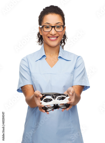 Photo: smiling female african-american doctor or nurse smiling female african-american doctor or nurse