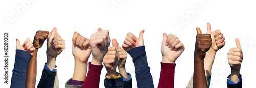 Photo: Multiracial Thumbs Up on White Background Multiracial Thumbs Up on White Background