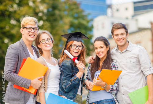 Photo: students or teenagers with files and diploma students or teenagers with files and diploma