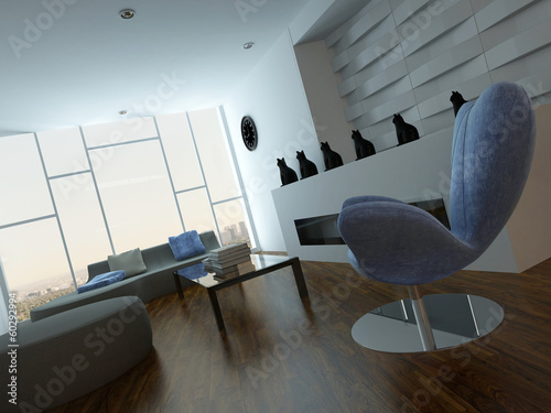 Photo: Modern lounge interior with blue armchair and cat vases Modern lounge interior with blue armchair and cat vases