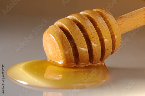 Photo: puddle of honey on the table puddle of honey on the table