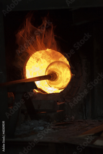 Photo: Glass blowing process Glass blowing process