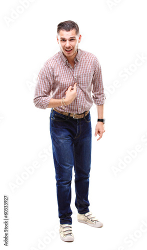 Photo: Attractive young man pointing thumb finger at himself Attractive young man pointing thumb finger at himself