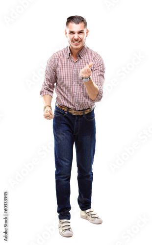 Photo: Excited handsome business man with arms raised in success Excited handsome business man with arms raised in success